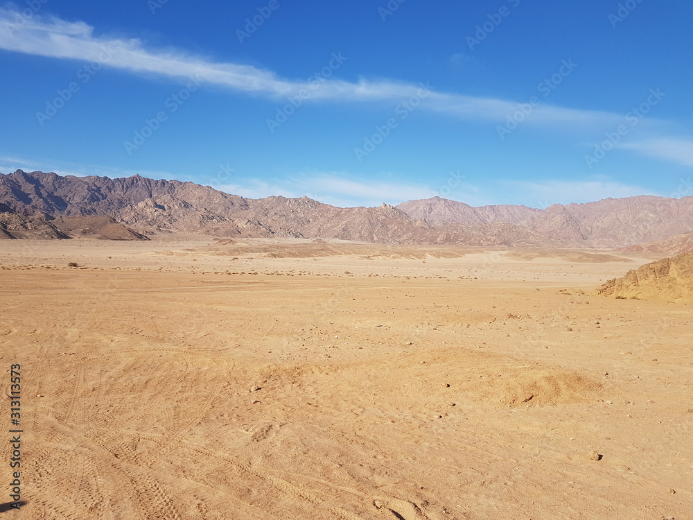 Landscape with mountains in Egypt. Rocky hills. Blue sky