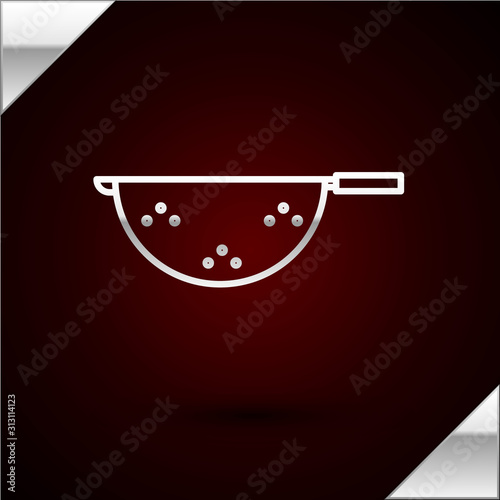 Silver line Kitchen colander icon isolated on dark red background. Cooking utensil. Cutlery sign. Vector Illustration