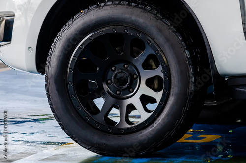 Slika na platnu Car tires and black mag