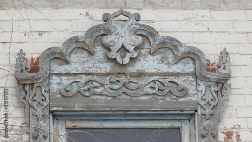 Wooden jambs and lintel of a window