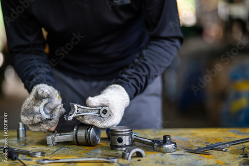 broken connecting rod of piston air compressor pump, Mechanical maintenance and repair background