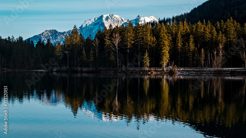 Beautiful alpine view with reflections at the famous Hintersee, Ramsau, Berchtesgaden, Bavaria, Germany