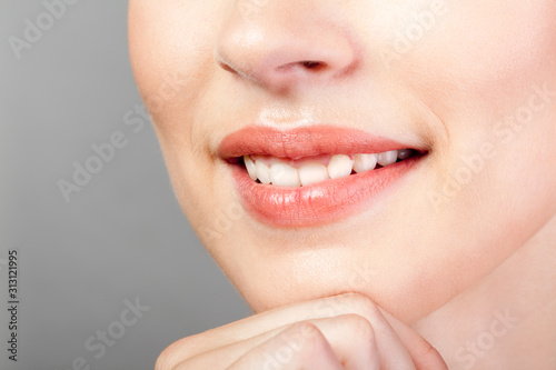 Perfect natural smiled lips makeup close-up