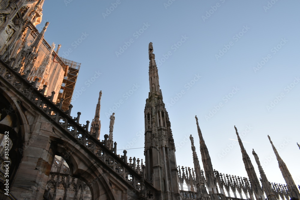 Milan cathedral rooftop pillars architecturea