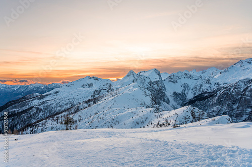 Spectacular winter mountain panoramic view of mountains at sunset. © anzebizjan