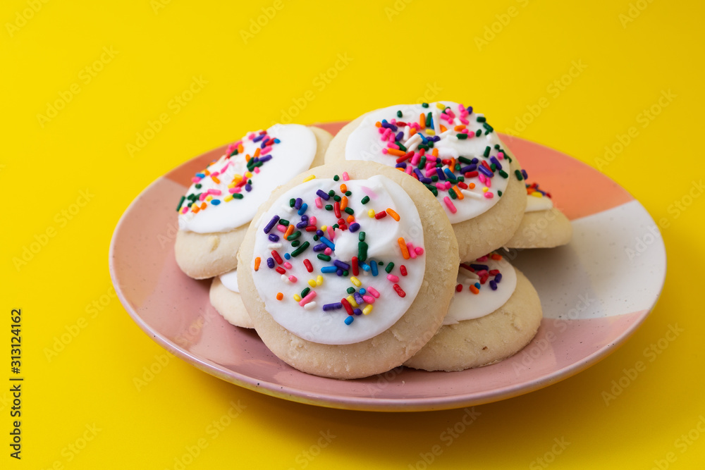 Sprinkle cookies with vanilla icing Sprinkle cookies with vanilla icing