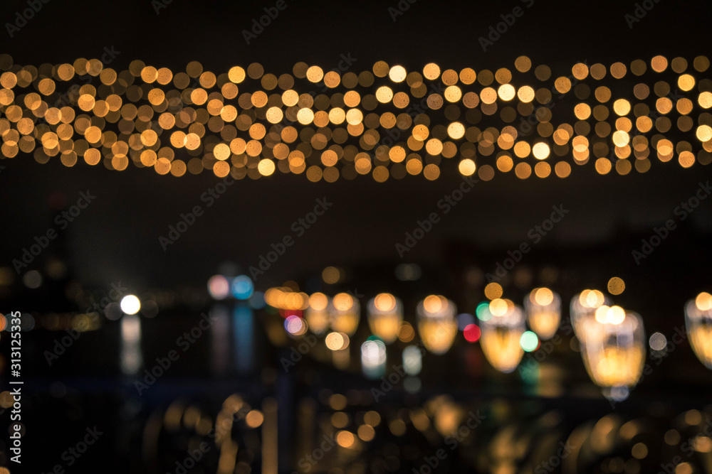 Russia, Moscow. Festive Christmas illumination. View from the bridge. Blur effect, copyspace