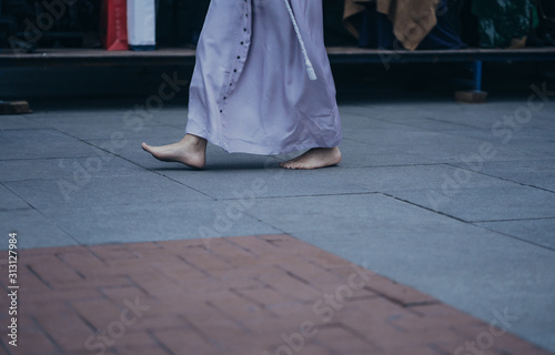 Barefoot Prayer During Christian Celebration.