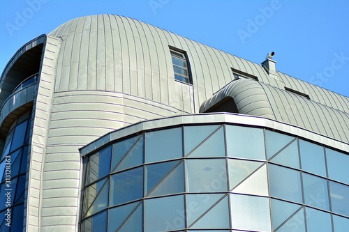 The windows of a modern building for offices. Business buildings architecture.