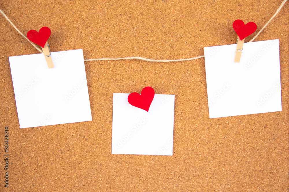 red heart note paper on cork board red heart note paper on cork board