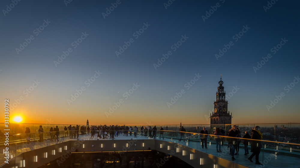 GRONINGEN - NETHERLANDS, December 30, 2019: The new Forum building, a landmark, in the city of Groningen. View from the roof during sunset