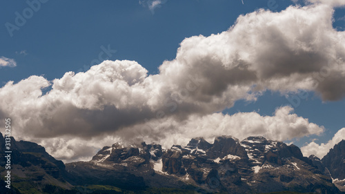 glimpse of the imposing Dolomites of Val di Sole