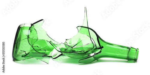 Glass shards, broken wine bottle isolated on white background photo