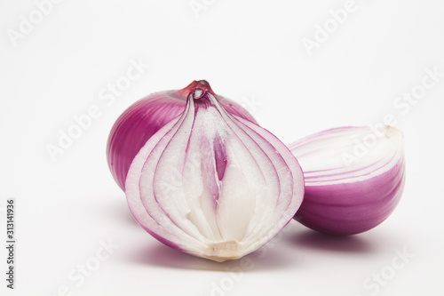 Many sliced onion isolated on white background