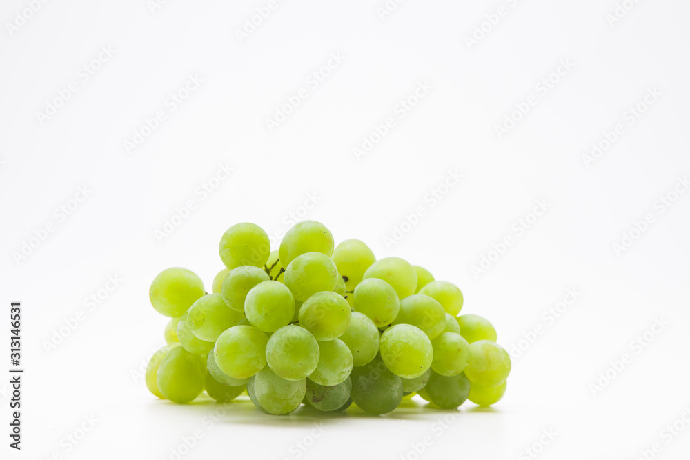Bunch of green grapes isolated on a white 