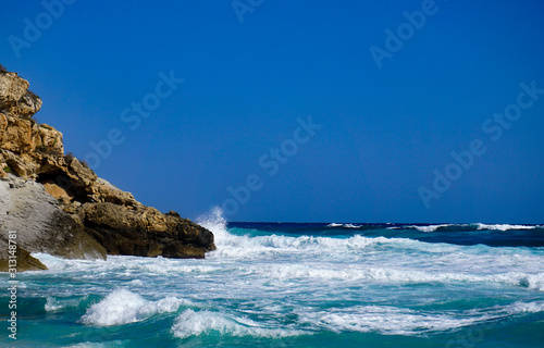 Breaking waves on rocks