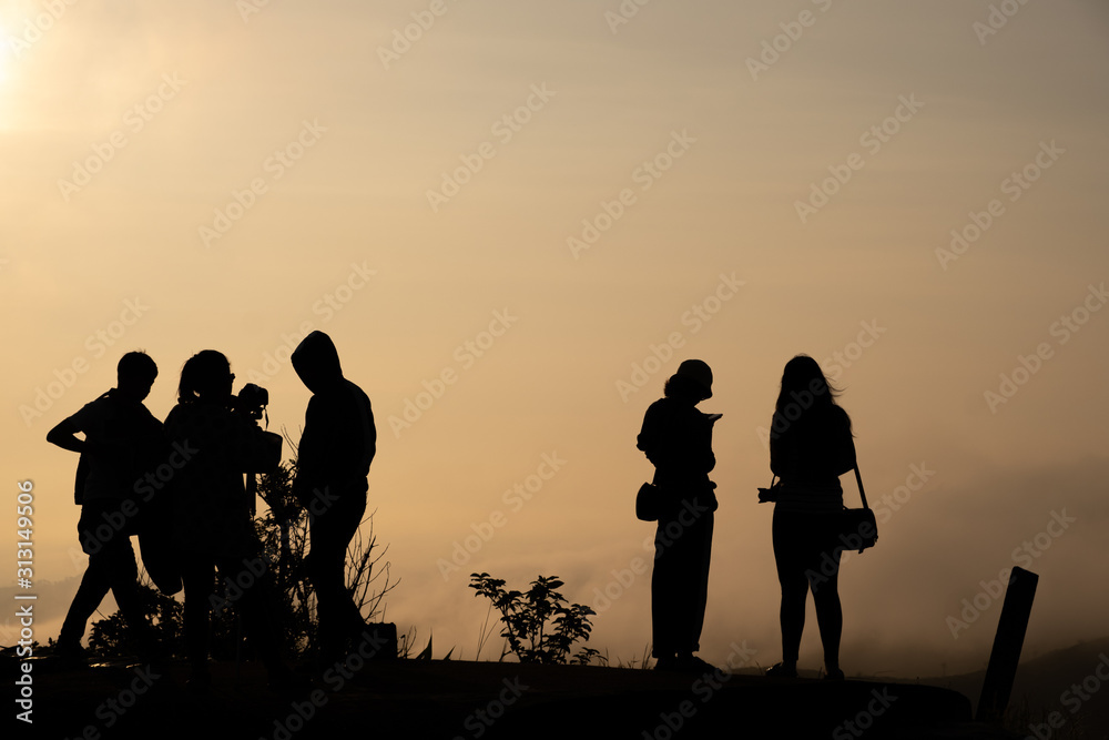 Tourists are watching the light of the sun in the morning