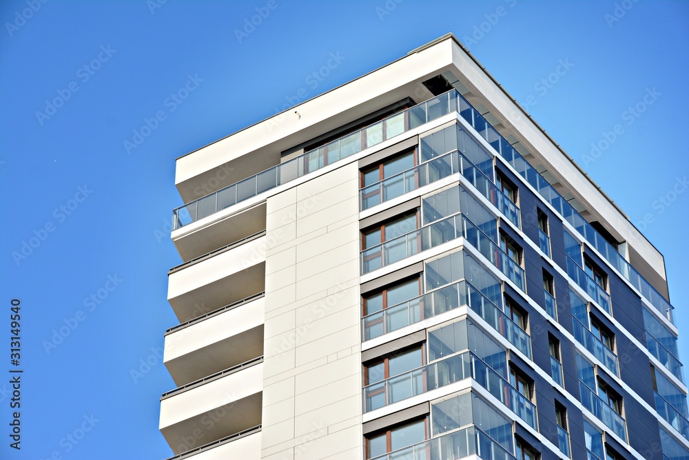 Modern apartment buildings on a sunny day with a blue sky. Facade of a modern apartment building.