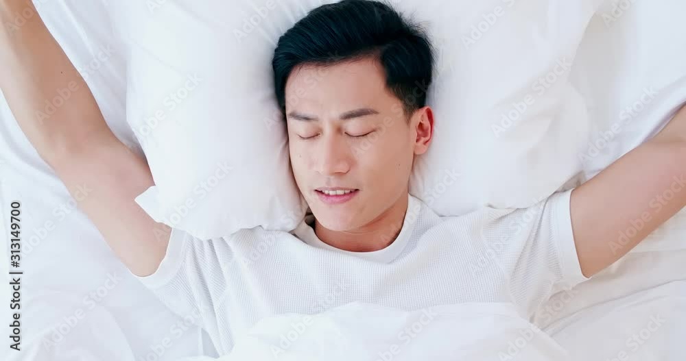 man sleeping well in bed man sleeping well in bed