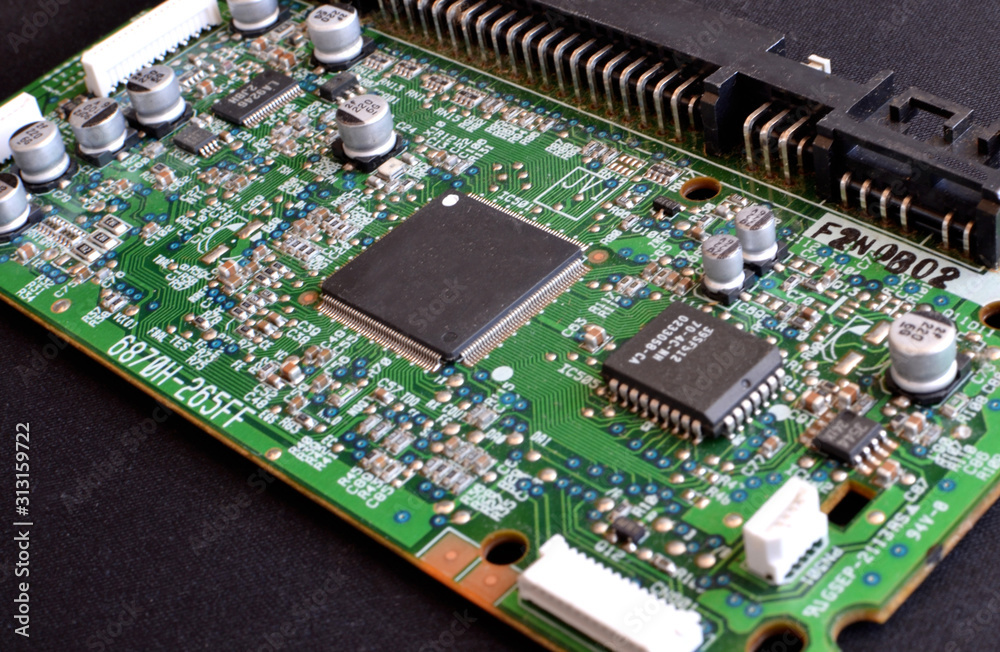 Green motherboard with chips and transistors Green motherboard with chips and transistors