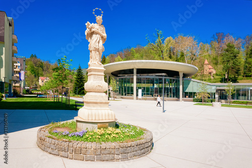 Janez Nepomuk religious saint sculpture in Old city at Medical center in Rogaska Slatina in Slovenia in South Styria. Travel in Europe Slovenian luxury spa resort. John Nepomucene Velfin statue photo