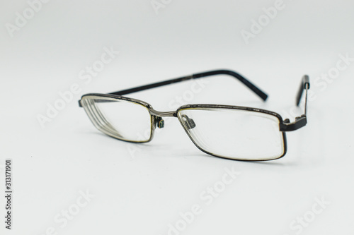 old glasses isolated on white background