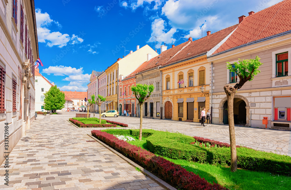 Street in Old city in Varazdin in Croatia. Cityscape with tourists in famous Croatian town in Europe in summer