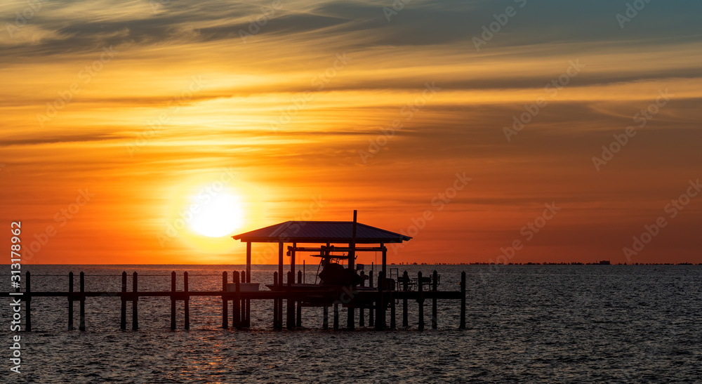 Sunset over a pier in Florida 