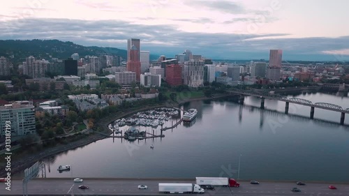 Aerial flying over the river and Portland Oregon city skyline in the distance. photo
