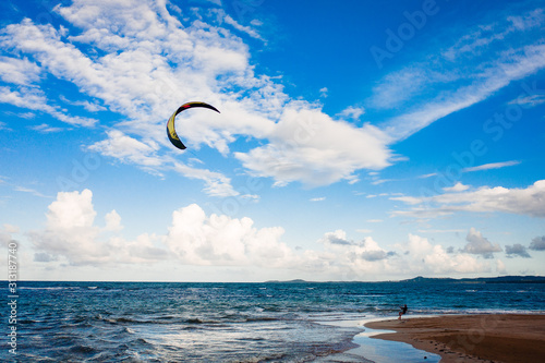 sea and blue sky kite photo