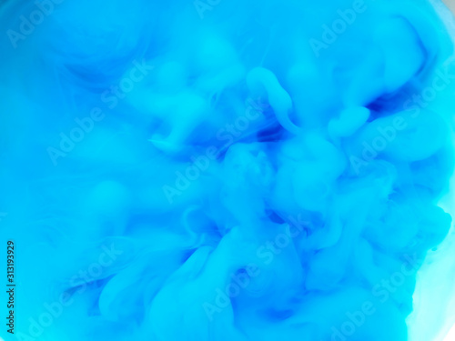 background of divorce dissolution of blue paint in the clear water