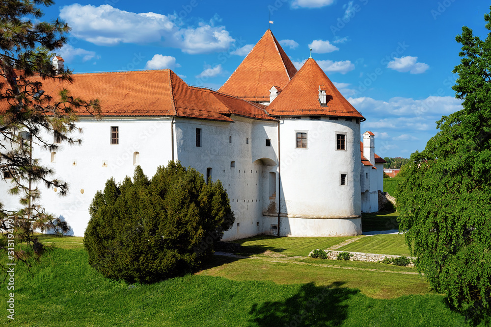 View of Castle at Street at Old city of Varazdin in Croatia. Panorama and Cityscape of famous Croatian town in Europe in summer. Travel and tourism for tourists.