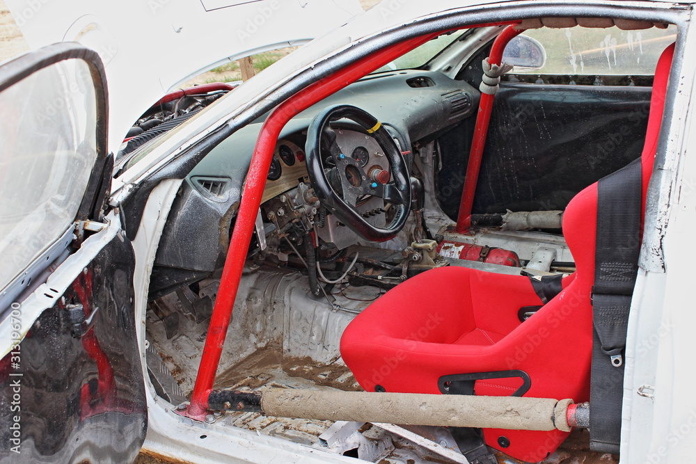 Autocross racing car cockpit interior inside, cages, red sport seat and