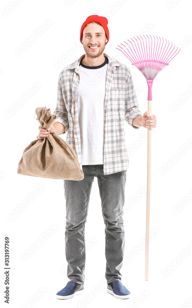 Man with rake for autumn leaves clean-up on white background Man with rake for autumn leaves clean-up on white background