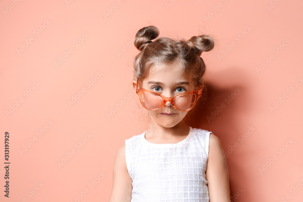 Cute fashionable girl on color background - obrazy, fototapety, plakaty 