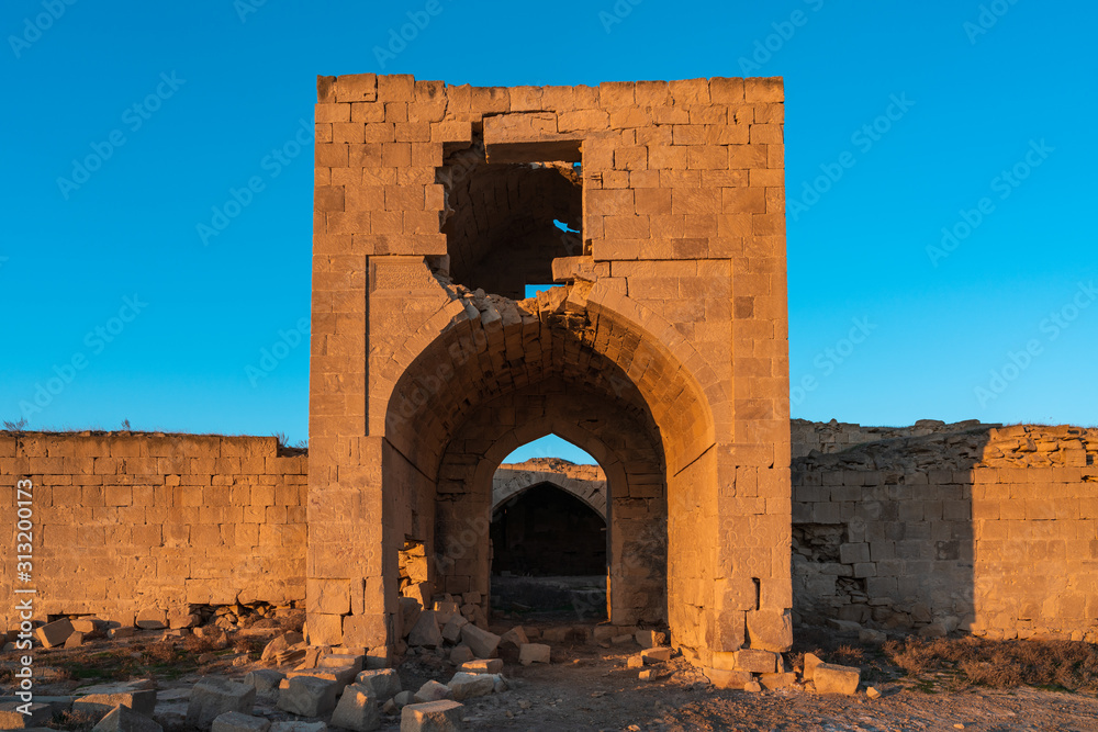 Ruins of an ancient caravanserai of the 14th century, located in the Gobustan steppes, Azerbaijan