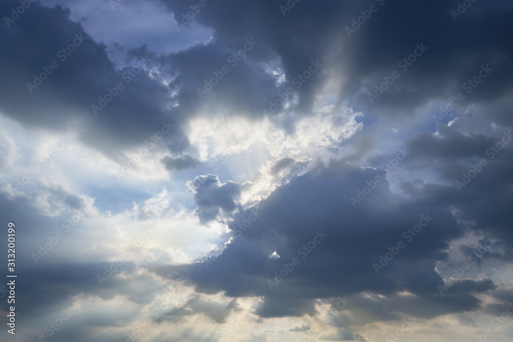 amazing cloudscape with god ray light beams