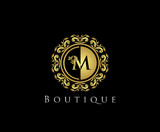 Golden M Boutique Logo Icon, Luxury M Letter Logo Design.