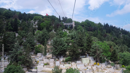Canvas Print view from moving cableway cabin to traditional Muslim cemetery located on hills