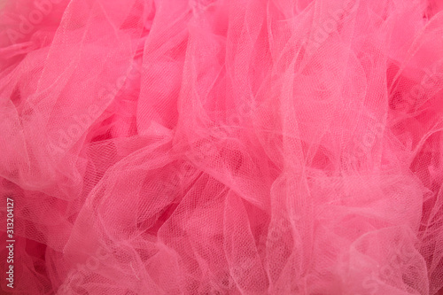 This is a photograph of Pink Tulle Tutu closeup background