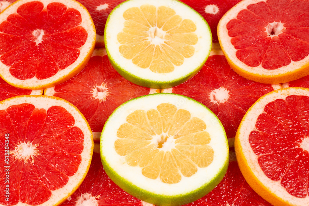 Pomelo and grapefruit slices background.