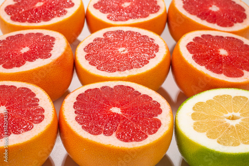 Pomelo and grapefruit slices background.