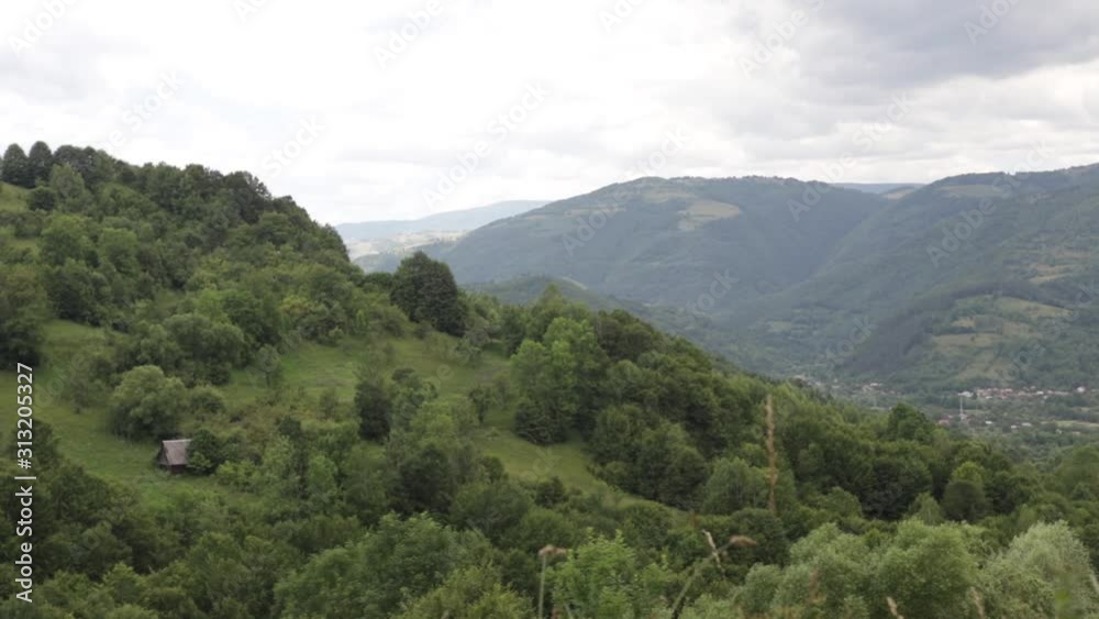 A beautiful wooden cabin on the top of the green mountains in Apuseni. A beautiful wooden cabin on the top of the green mountains in Apuseni.