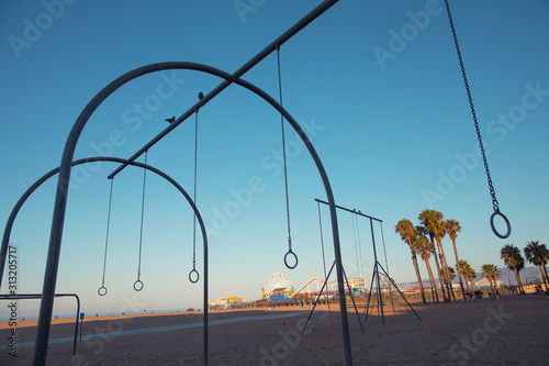 Travelling Rings for exercise at muscle beach jungle gym on in Santa Monica, California at early morning