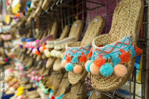 Canvas Print Colorful handicraft shoes selling at the market in Bangkok,Thailand
