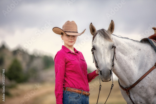 Girl with grey horse