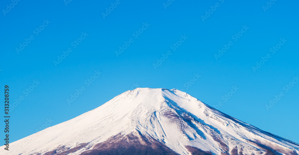 Mount Fuji, Fujiyama Top beautiful snow could for Japan beautiful landscape Highest point with blue sky, view from Mount winter Fujisan for traver and landmark in tokyo in sunlight blue sky,closeup