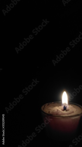 A Blur Candle picture in dark background