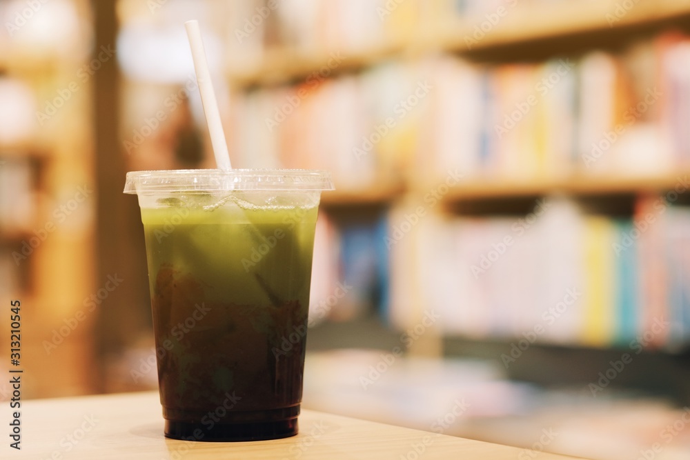 Ice green tea on recycle plastic cup and paper straw Ice green tea on recycle plastic cup and paper straw