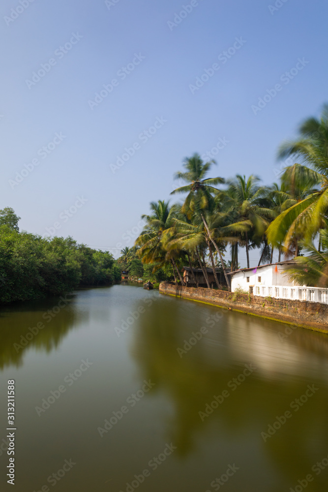 Tranquil long exposure fishing landscape at Cutbona Jetty in Goa Tranquil long exposure fishing landscape at Cutbona Jetty in Goa